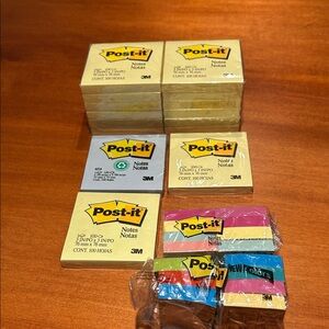 15 unopened Post it notes 3 inch by 3 inch 15 2 by 1 1/2 inch post it notes.